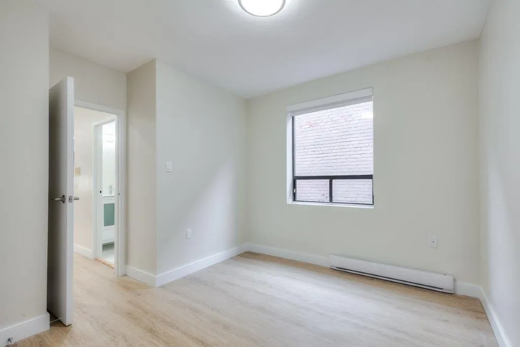 bedroom with hardwood floors