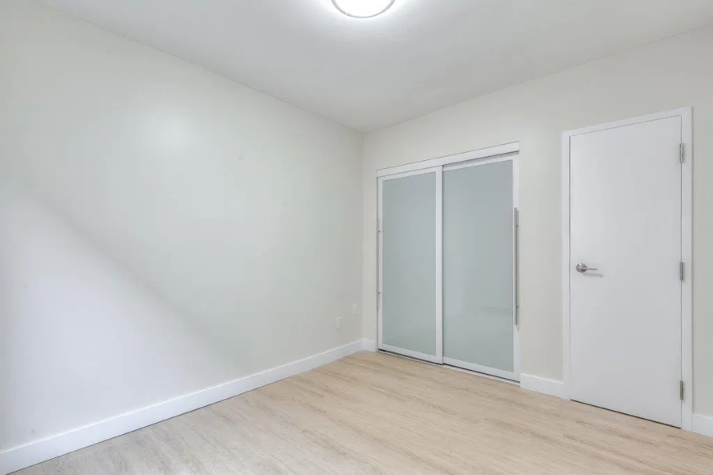 bedroom with hardwood floors