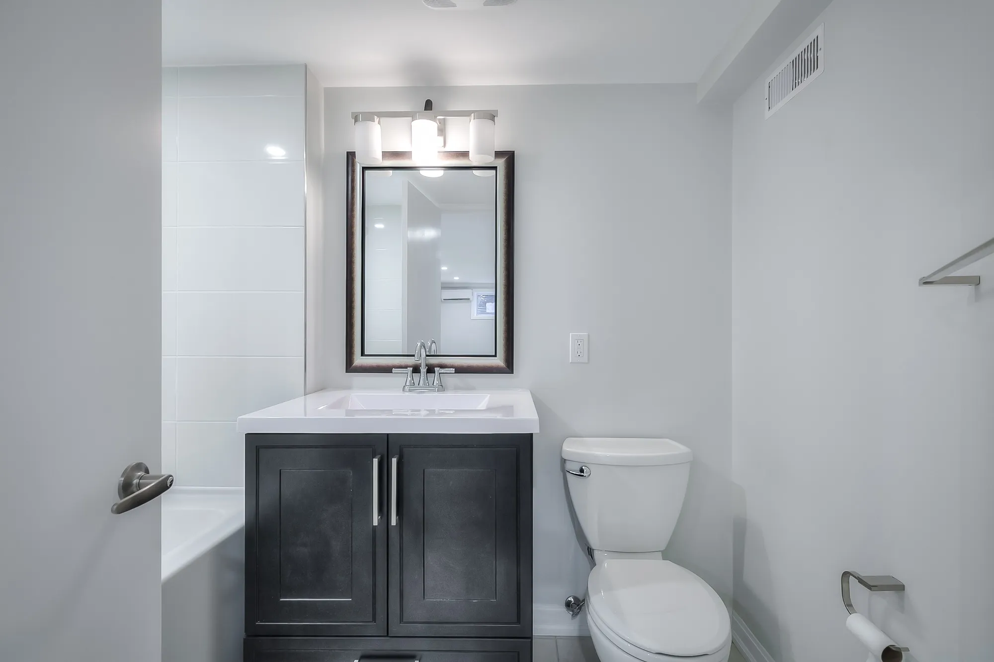 bathroom vanity and toilette