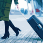 illustration of a woman pulling a suitcase