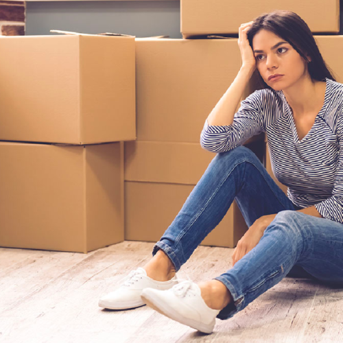 woman packing after inheriting property