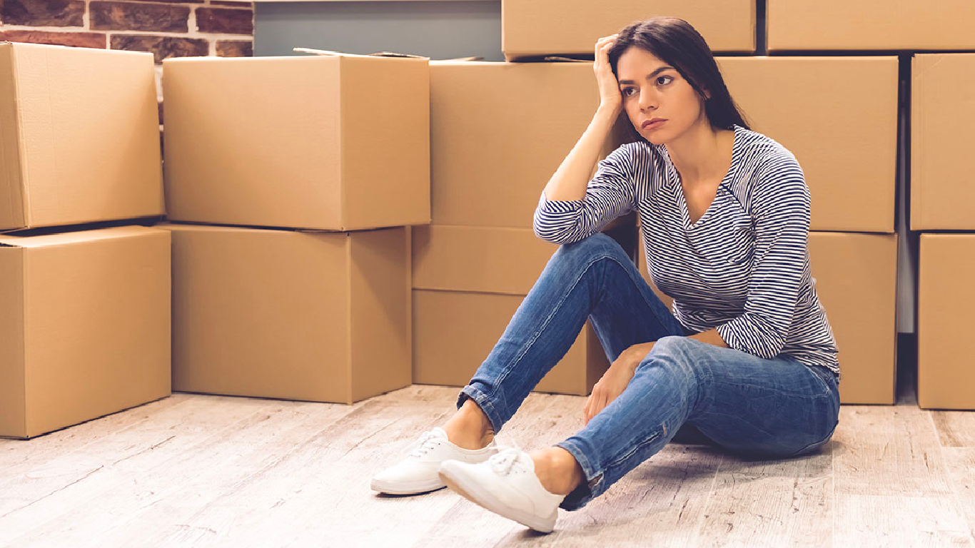 woman packing after inheriting property