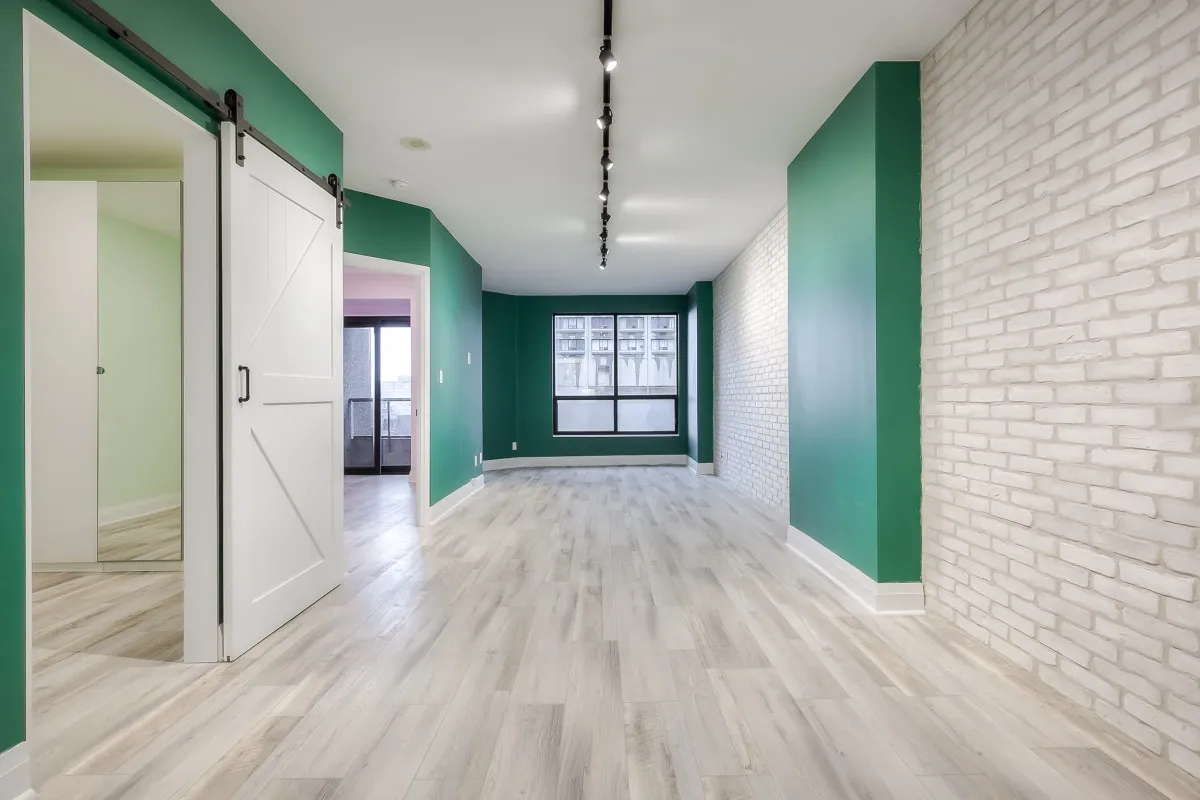 A room with white walls and green walls