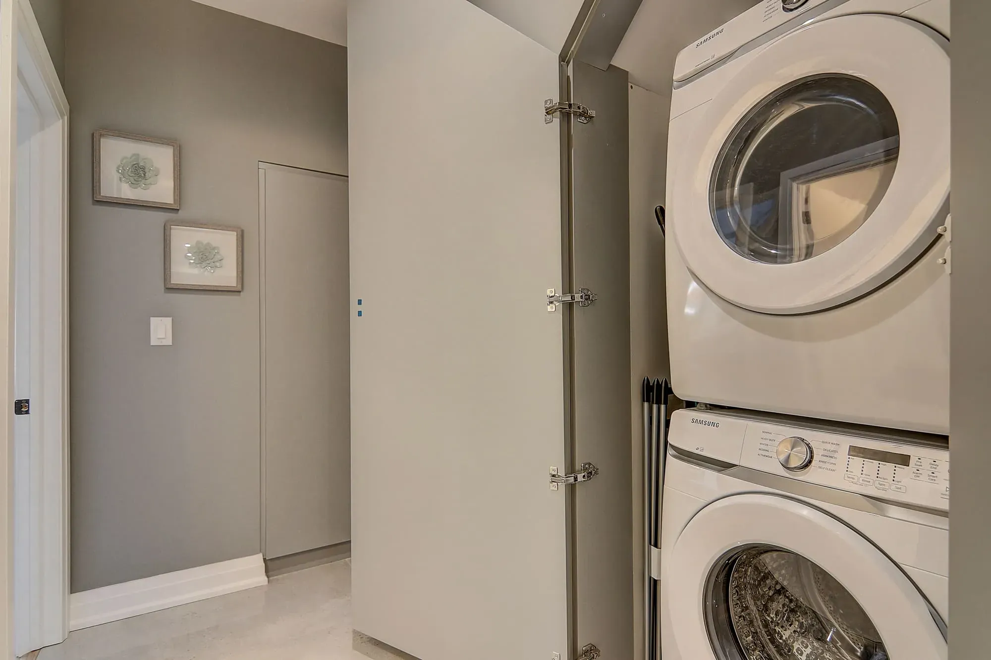 A washer and dryer in a laundry room