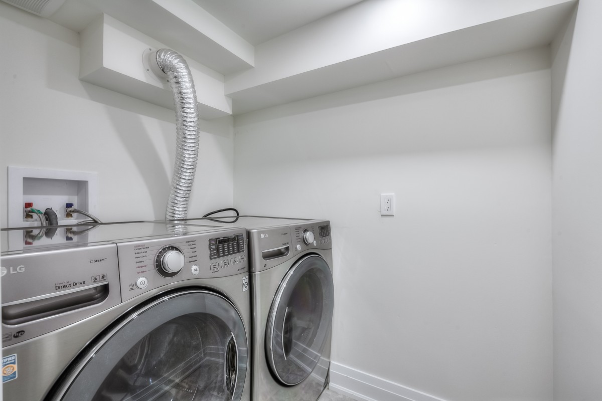 A washer and dryer in a laundry room