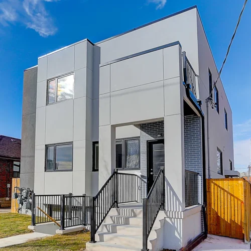 A house with a 4 units and front stairs