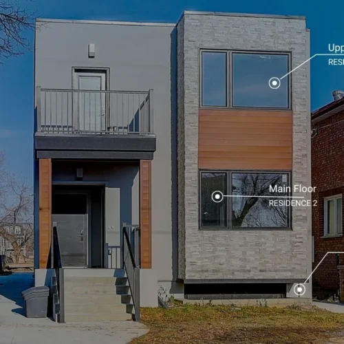 A two story building with a balcony LandLord rentals