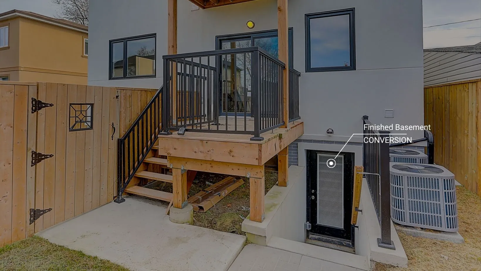 A house with a black railing LandLord rentals