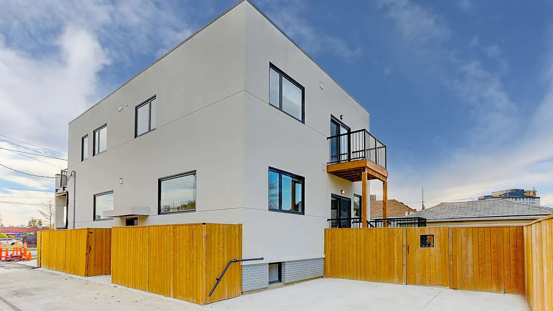 The rear view of a fourplex property in Toronto