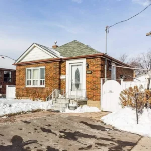 an old bungalow single family property made of bricks