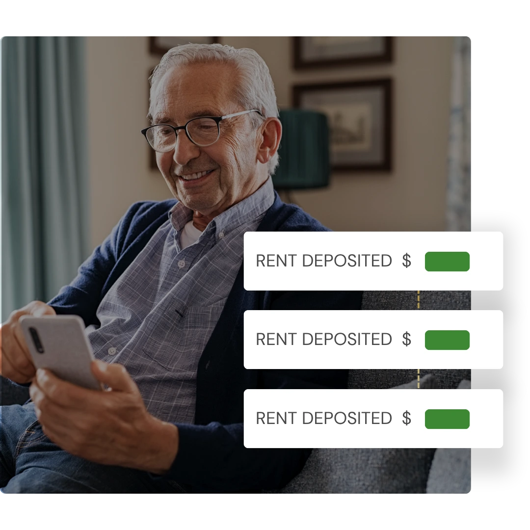 Smiling property owner checking phone with rent deposited notifications on screen, representing automated rent collection