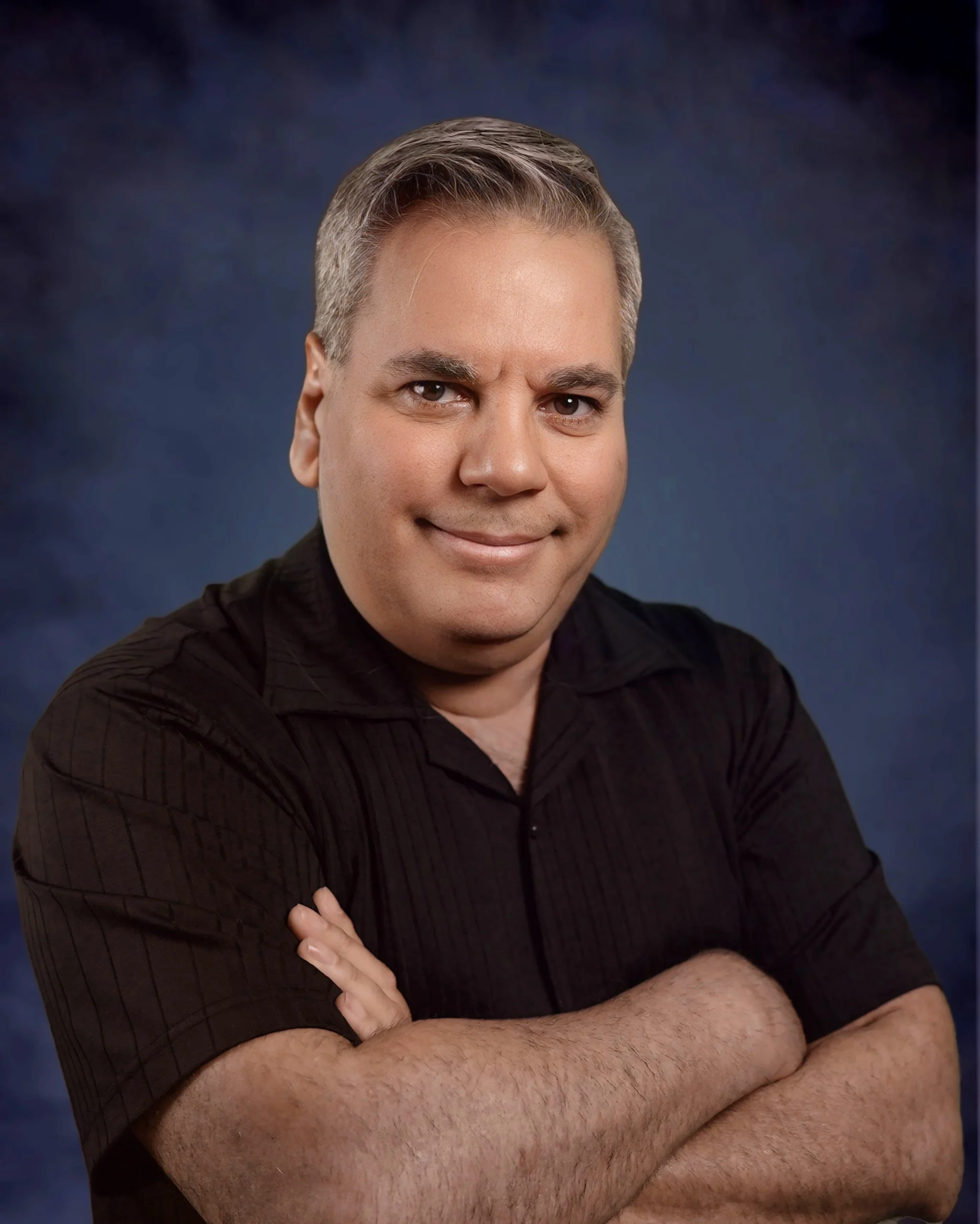 Professional headshot of George, member of the real estate team.