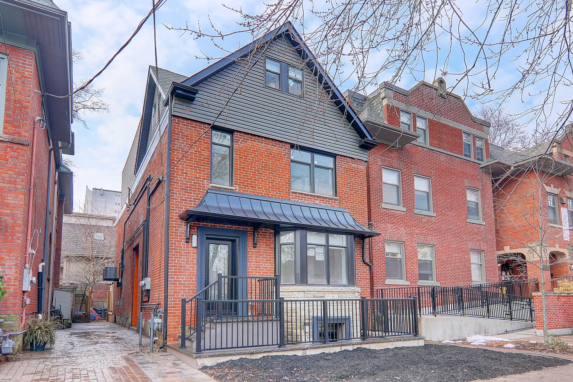 Toronto house reconfigured into a multi-unit investment property